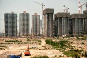 China property bound for stricter rules as home prices rise